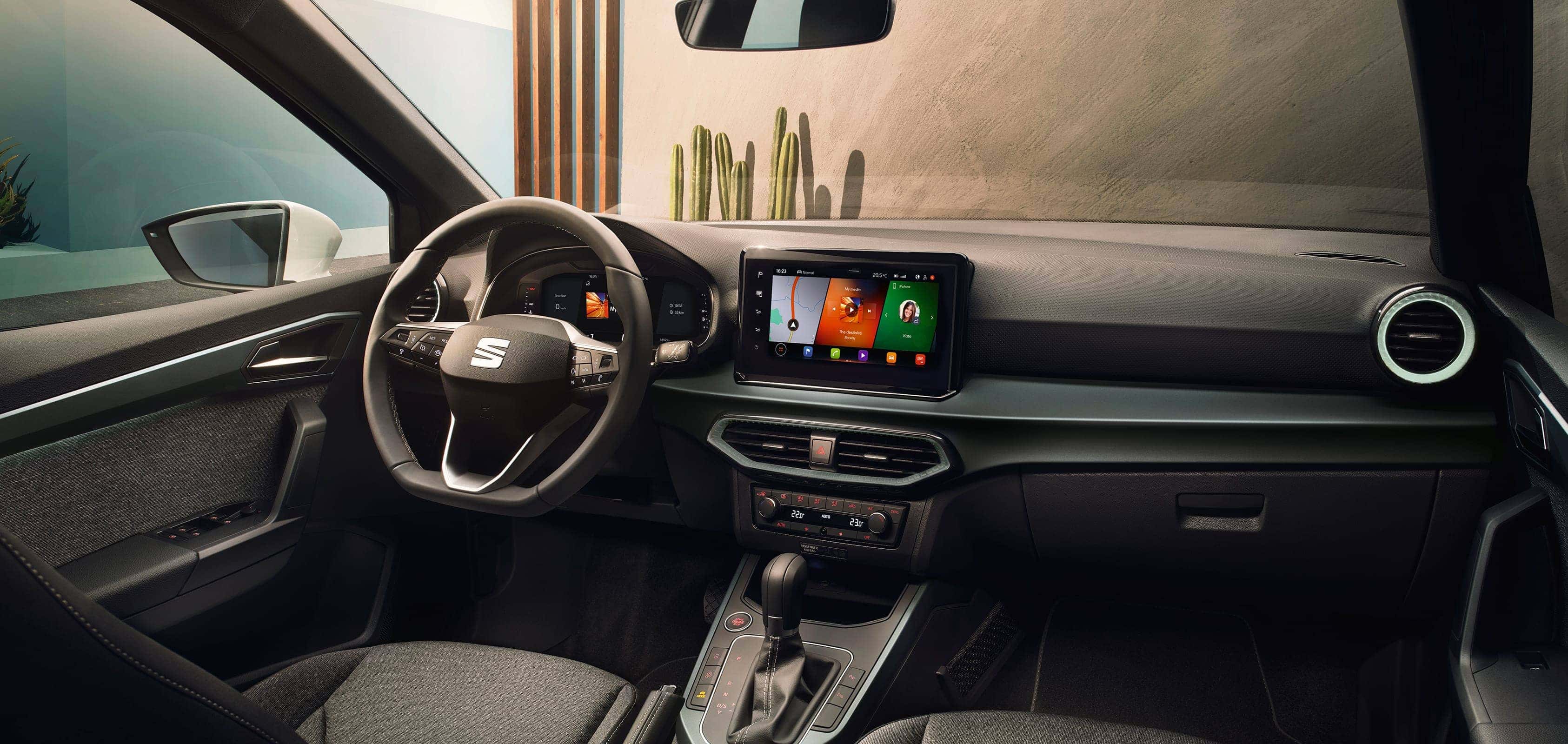 SEAT Arona interior view of the steering wheel and infotainment screen