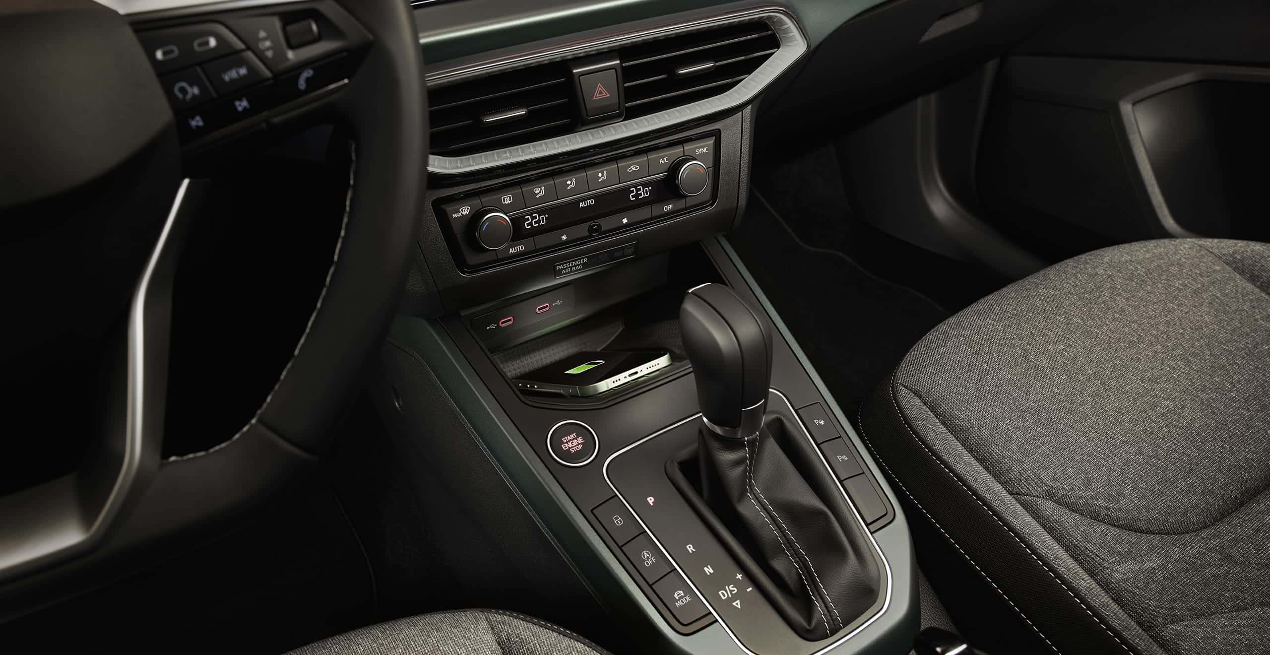 SEAT Arona interior view with smartphone connected to the infotainment screen  