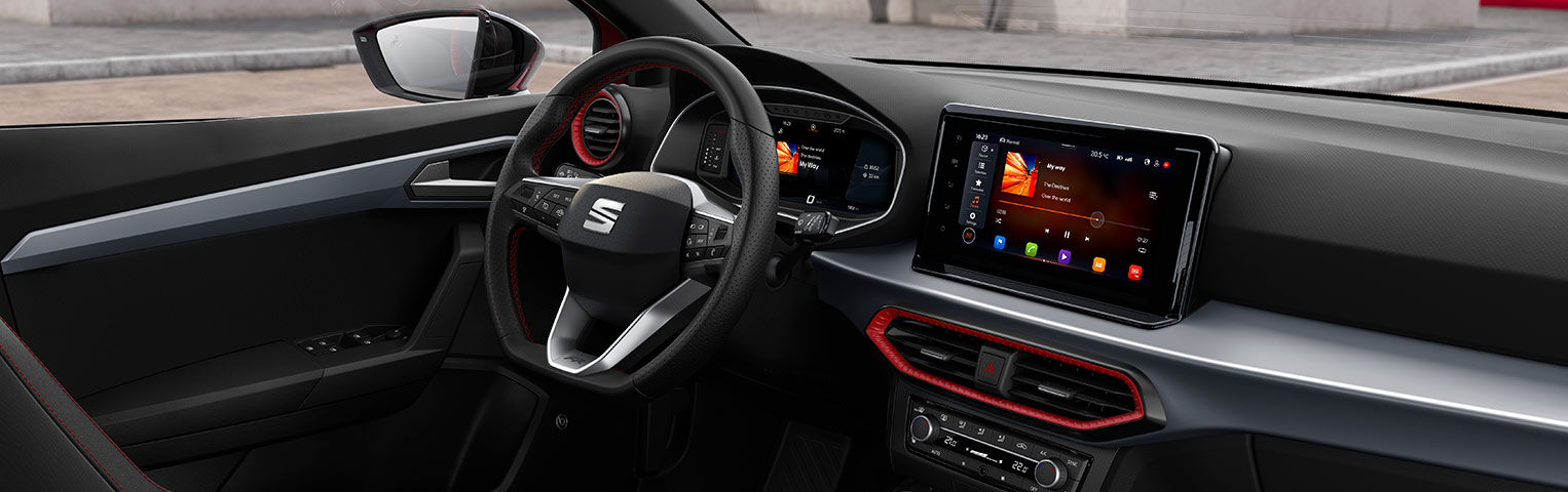 https://www.seat.co.uk/content/dam/countries/gb/seat-website/carworlds/ibiza-pa/technology/hero-product/my20-v1/S-seat-ibiza-interior-view-with-the-steering-wheel-and-infotainment-screen.jpg