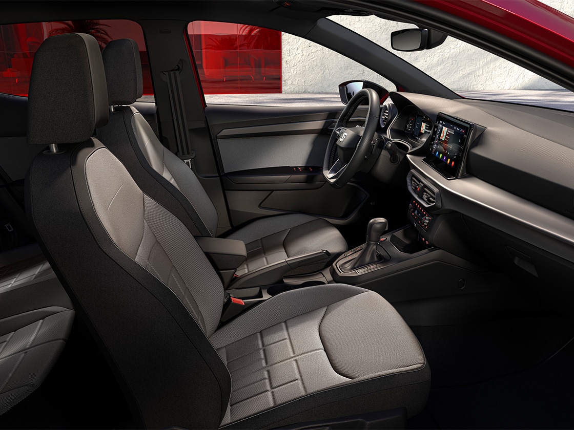 Seat ibiza interior details including the cloth comfort seats for reference in acero tone. 