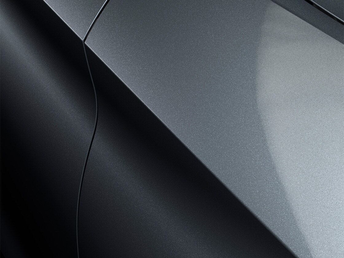 The leon  estate car, seat leon sportstourer in magnetic tech with a metallic finish, close up. 