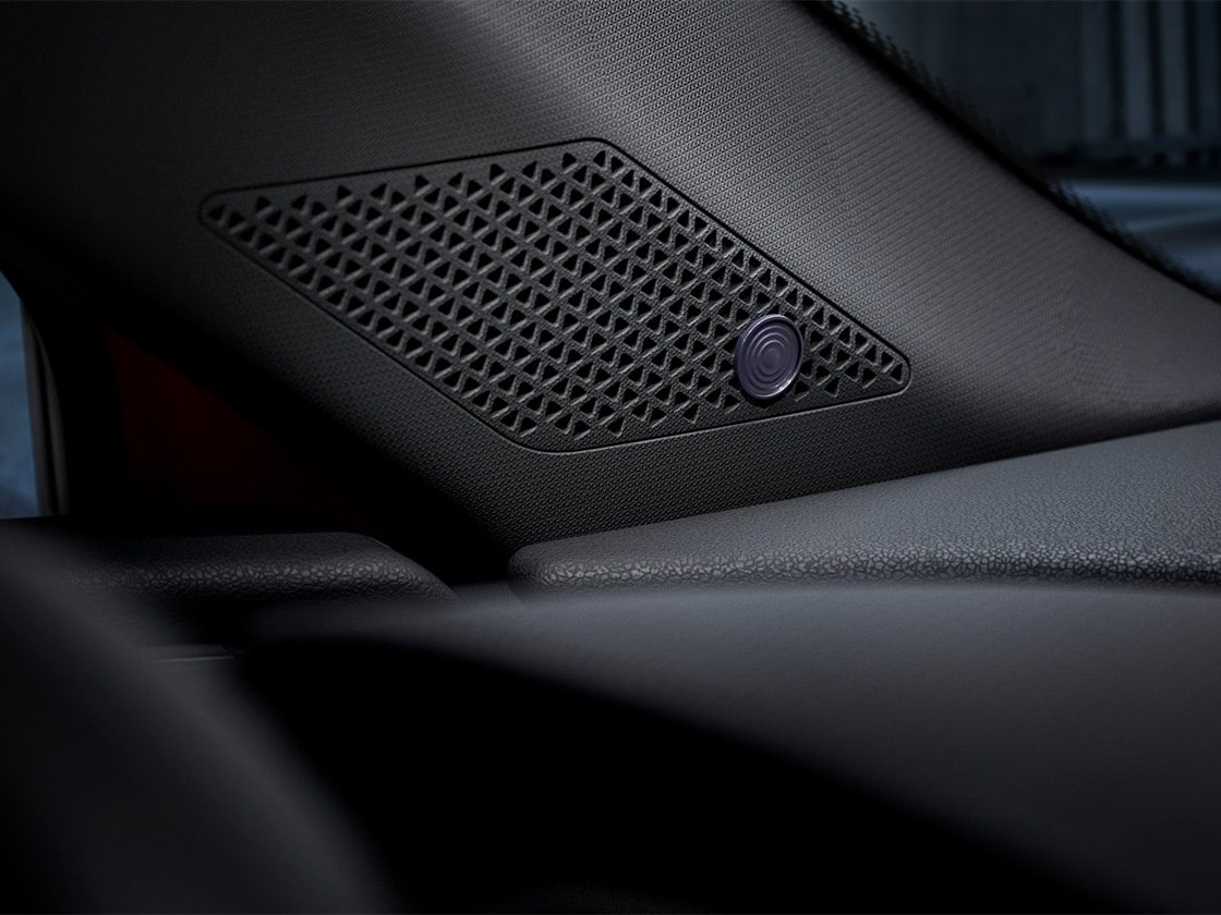Interior speaker close-up to show an example on how the SEAT Sound System distributes the acoustics within the vehicle.