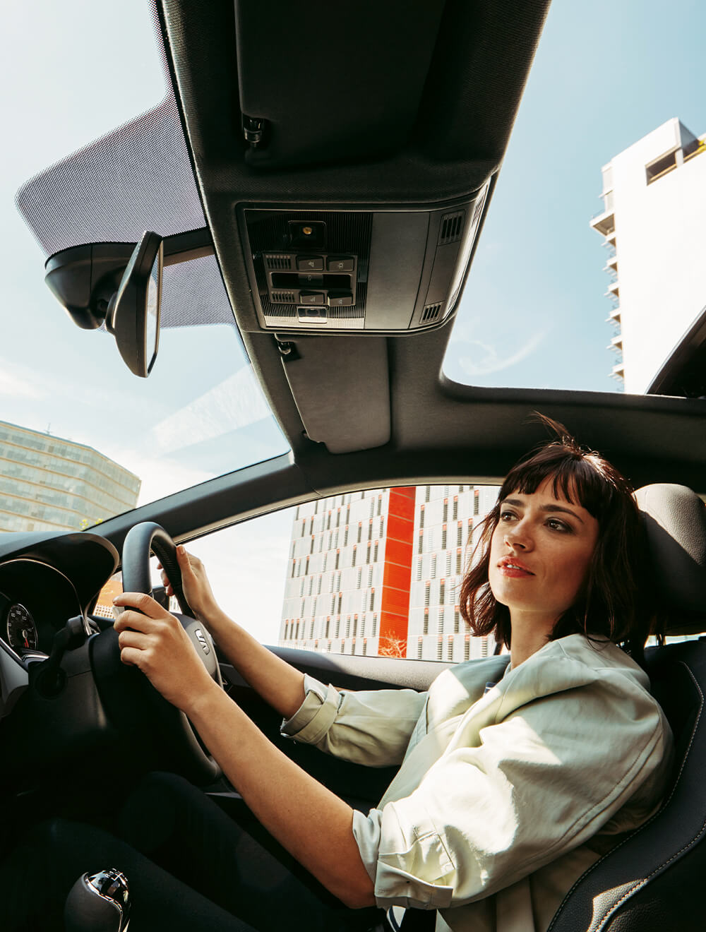 Interior view of woman driving
