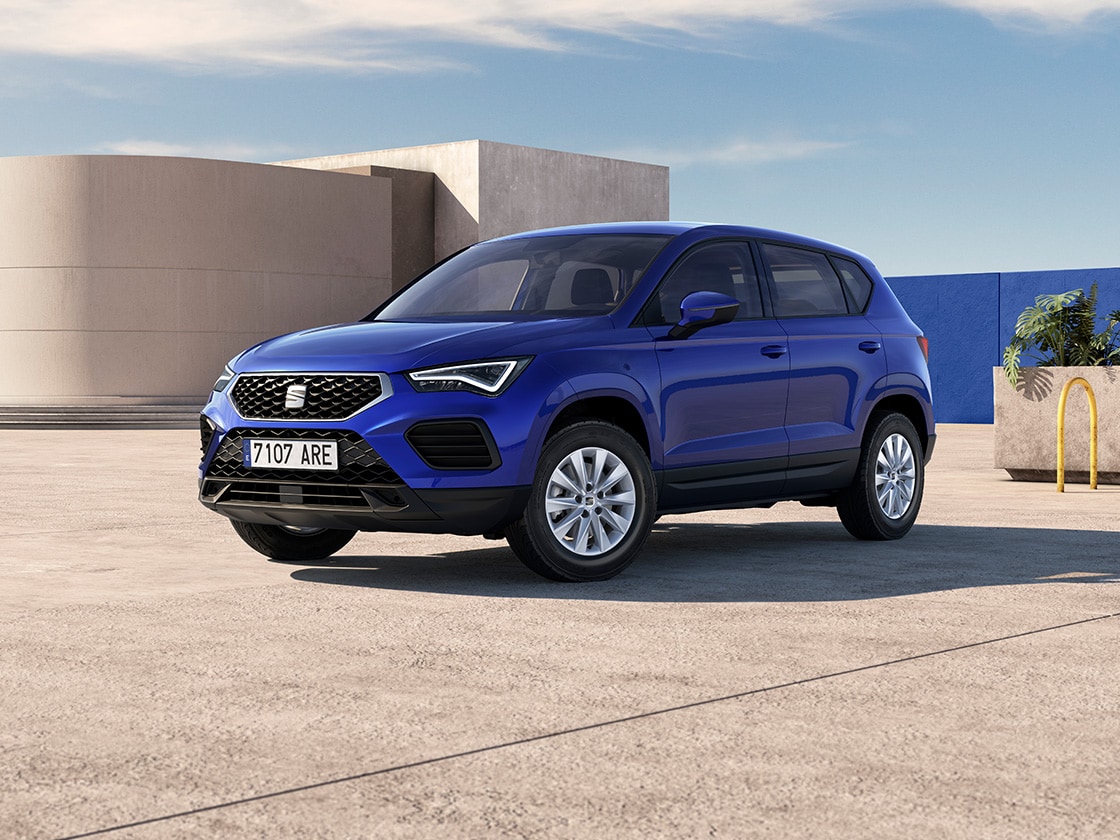 A blue SEAT Ateca in a carpark