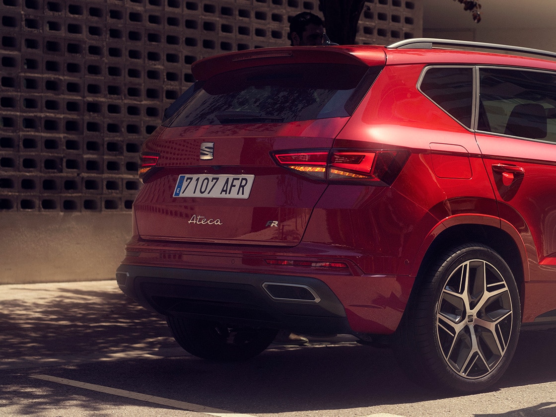 The back end of a red SEAT Ateca