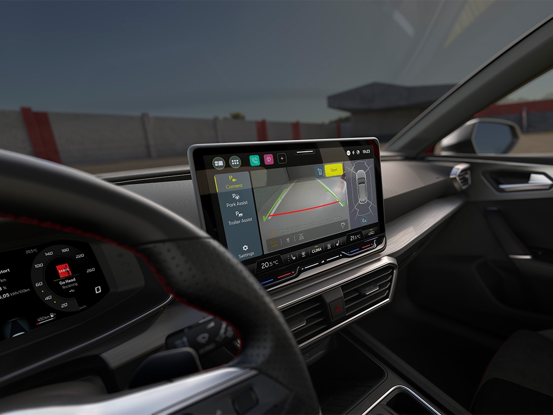 Interior view of the SEAT Leon Estate with touchscreen and park assist for parking smoothly.