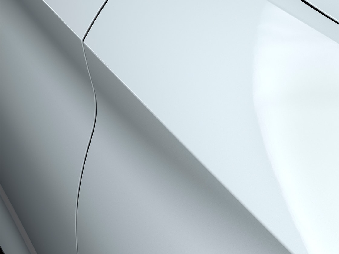 The SEAT Leon Estate in Glacial White with a metallic finish, close up.